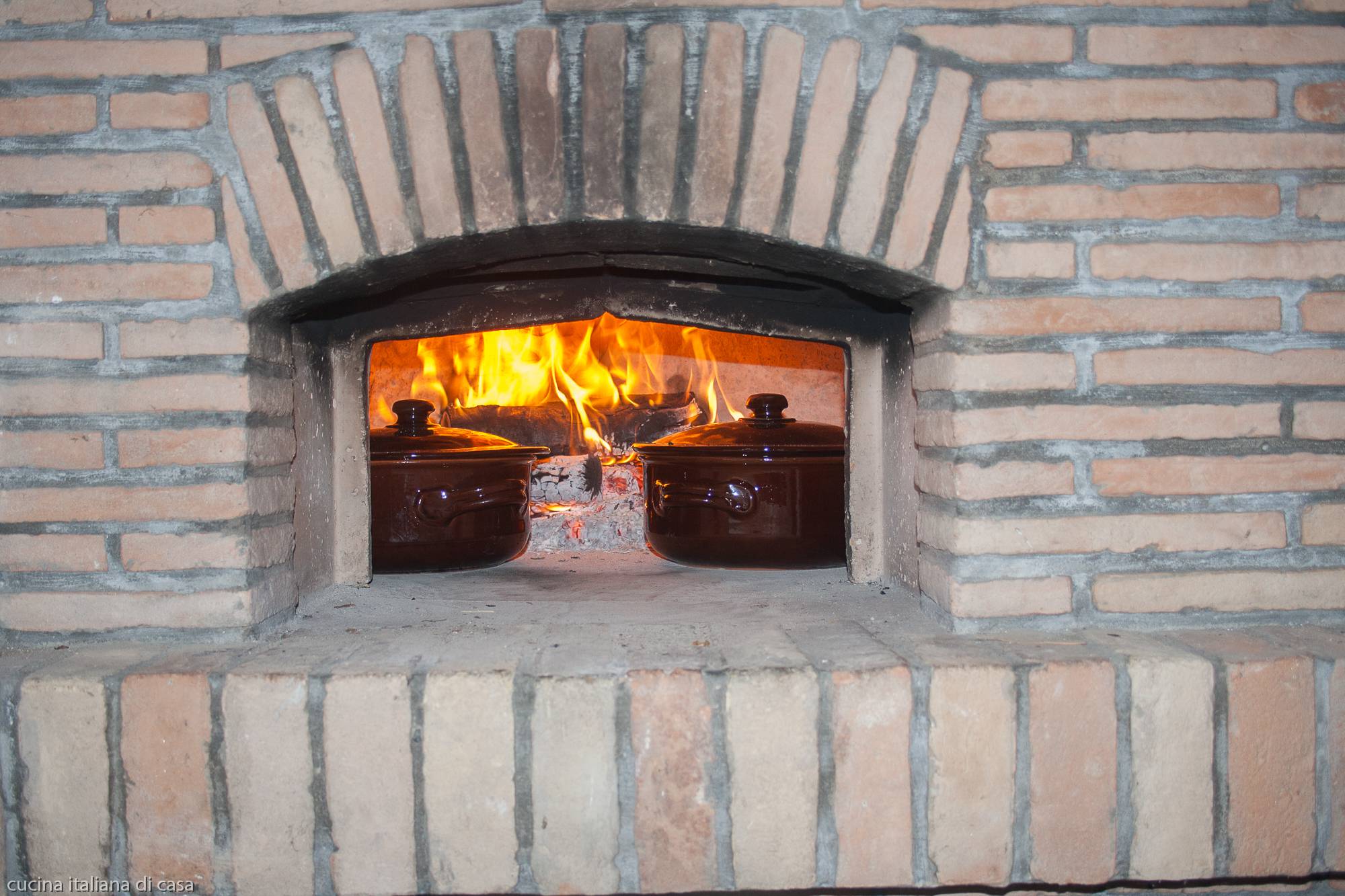 cottura con forno legna pentola coccio