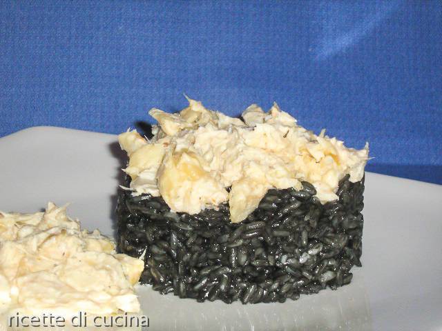 ricetta risotto nero seppia stocafisso mantecato