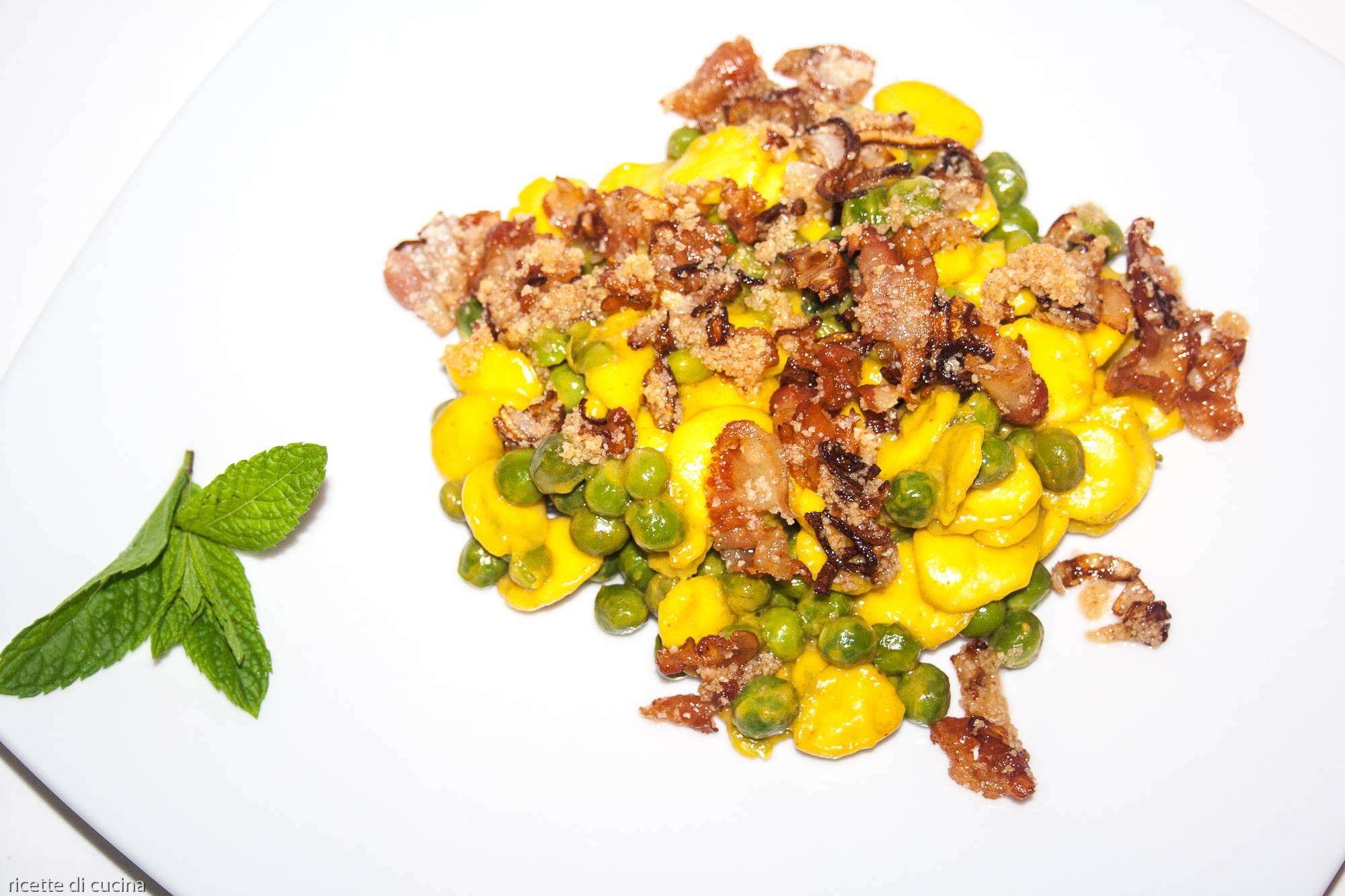 ricetta orecchiette piselli pancetta